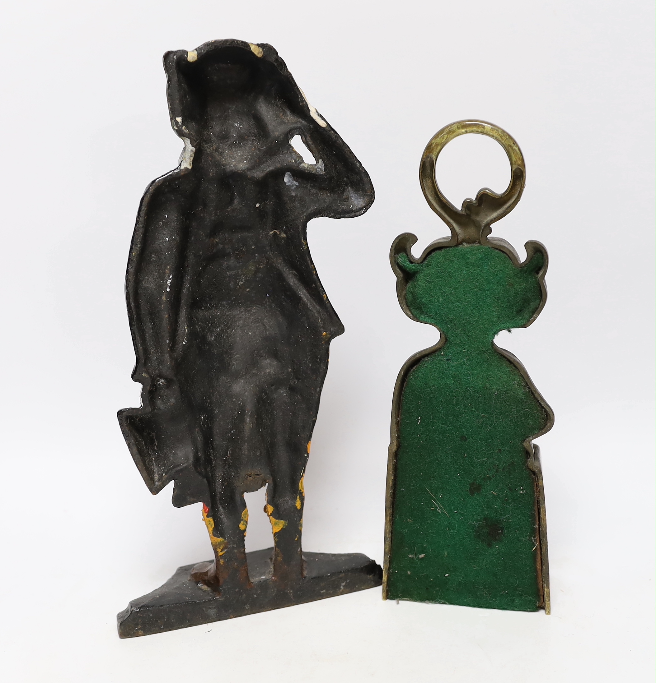 Two door stops including a cast iron ‘Mr Pickwick’ and brass Lincoln Imp, largest 36cm high